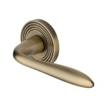 M Marcus Heritage Brass Door Handle Lever Latch on Round Rose Sutton Reeded Design