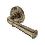 M Marcus Heritage Brass Door Handle Lever Latch on Round Rose Bridgetown Reeded Design