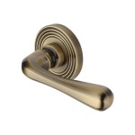 M Marcus Heritage Brass Door Handle Lever Latch on Round Rose Charlbury Reeded Design