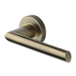 M Marcus Heritage Brass Door Handle Lever Latch on Round Rose Mercury Design