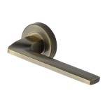 M Marcus Heritage Brass Door Handle Lever Latch on Round Rose Metro Angled Design