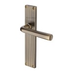 M Marcus Heritage Brass Octave Reeded Door Handle on Plate Antique Brass