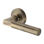 M Marcus Heritage Brass Door Handle Lever on Rose Hammered Bauhaus Design